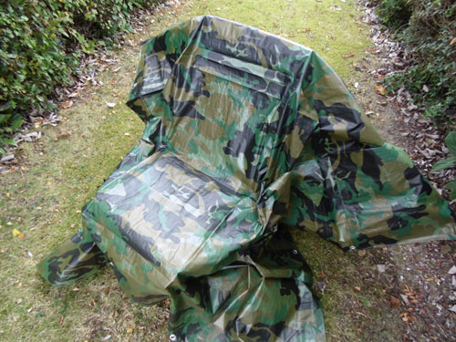 Camo Tarp Covering Garden Chair